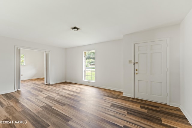 interior space with hardwood / wood-style flooring