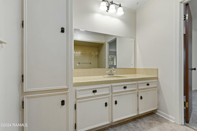 bathroom featuring vanity and crown molding