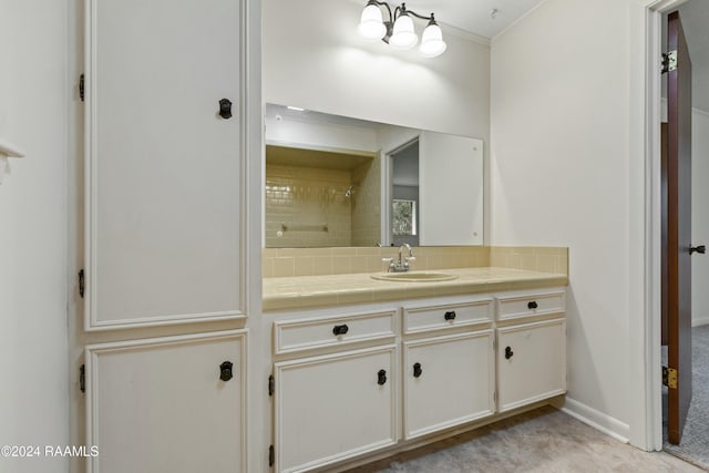 227 Meadow Ln, Lafayette, LA 70506 - bathroom featuring vanity, tasteful backsplash, and crown molding