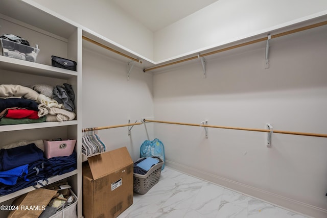 108 Timber Bark Rd, Lafayette, LA 70508 - walk in closet featuring marble finish floors