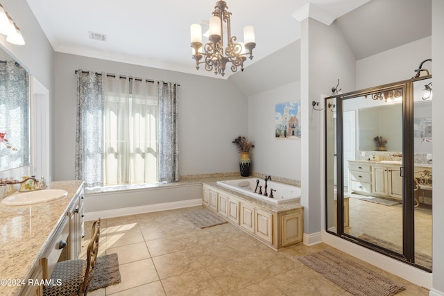 bathroom featuring tile patterned flooring, vanity, an inviting chandelier, and vaulted ceiling