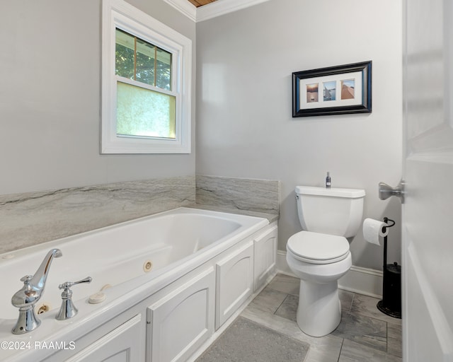 bathroom featuring a tub to relax in, crown molding, and toilet