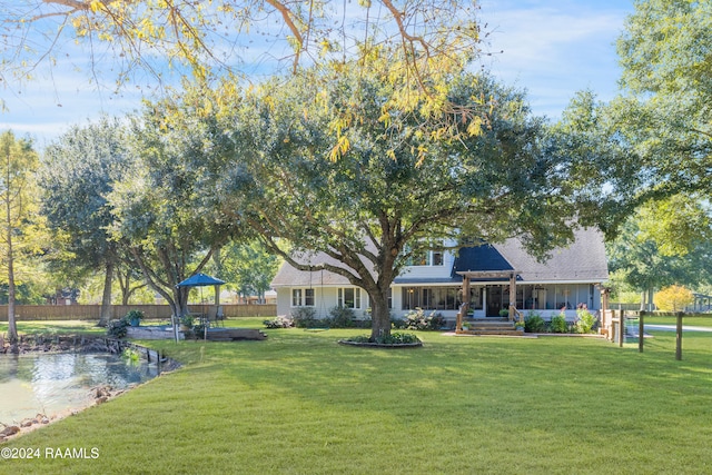 exterior space featuring a pergola and a yard