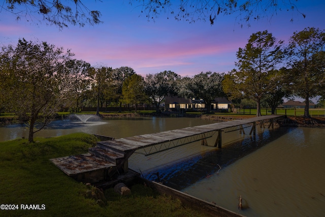 view of dock with a water view