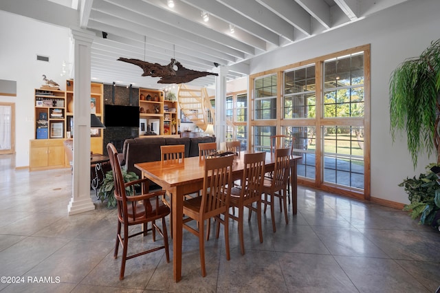 dining space with tile patterned flooring