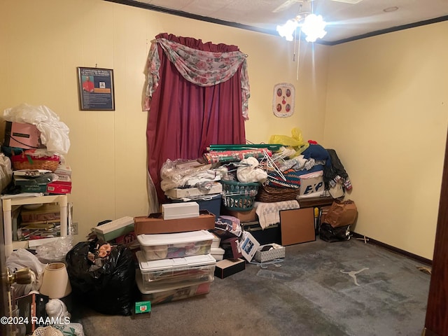 bedroom featuring carpet floors, ceiling fan, and crown molding