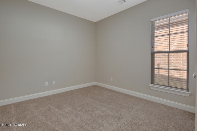 view of carpeted spare room