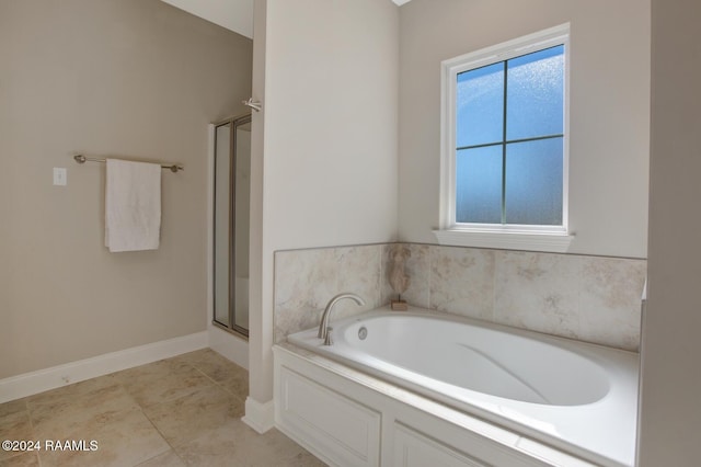 bathroom with independent shower and bath