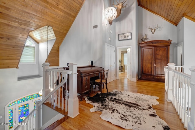 interior space with high vaulted ceiling, wooden ceiling, and wood-type flooring