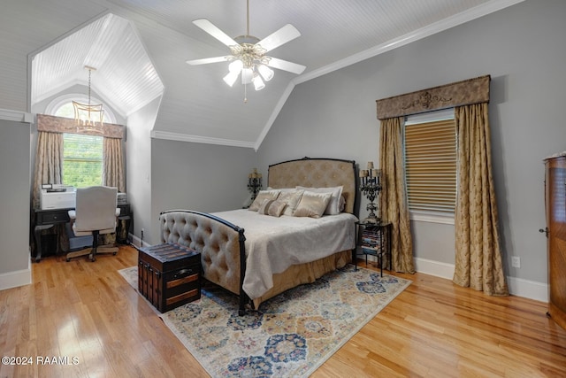 bedroom with ceiling fan, light hardwood / wood-style floors, lofted ceiling, and ornamental molding