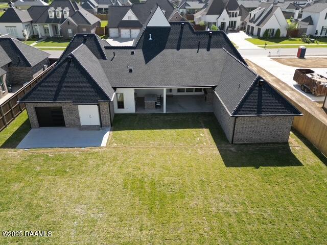 drone / aerial view with a residential view