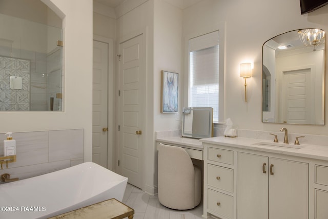 bathroom with vanity and tiled shower