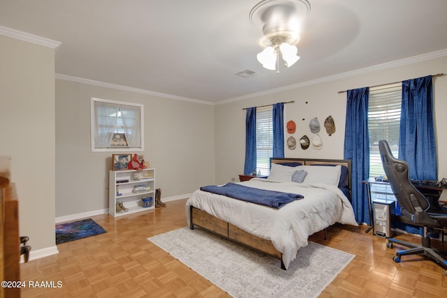 bedroom with light parquet floors, ceiling fan, and crown molding