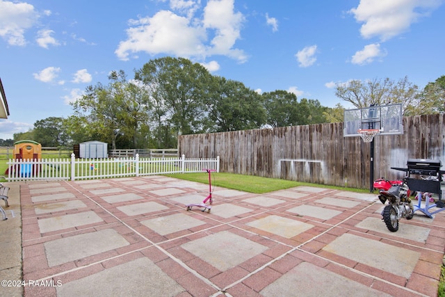 view of patio / terrace with a storage unit