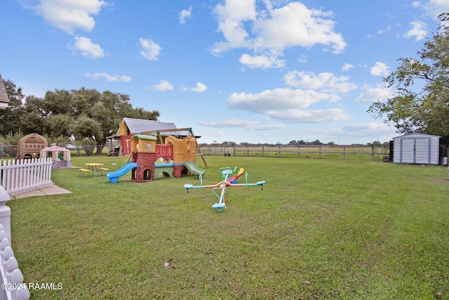 view of play area with a yard