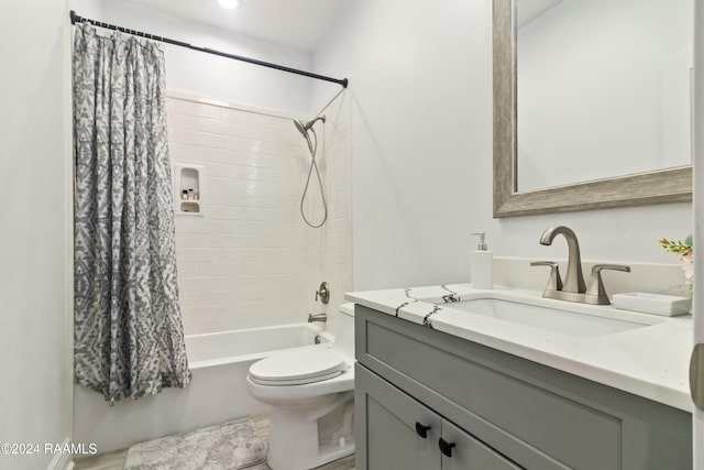 full bathroom with vanity, toilet, and shower / bathtub combination with curtain