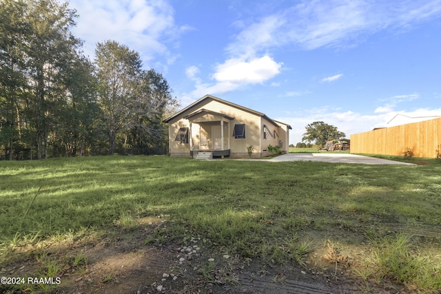 exterior space with a front yard