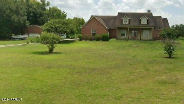 view of front of house with a front yard