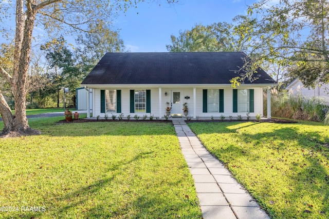 view of front facade with a porch and a front lawn