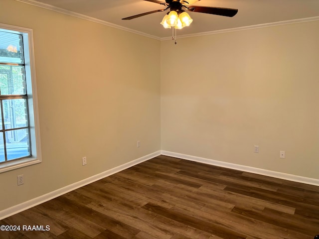 spare room with ceiling fan, dark hardwood / wood-style flooring, and ornamental molding