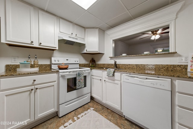 kitchen featuring a paneled ceiling, white appliances, ceiling fan, sink, and white cabinetry