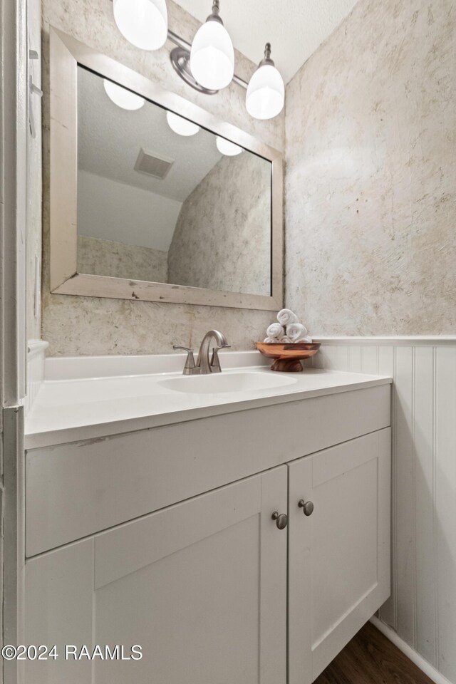 1316 Dulles Dr Apt H, Lafayette, LA 70506 - bathroom featuring vanity and wood finished floors