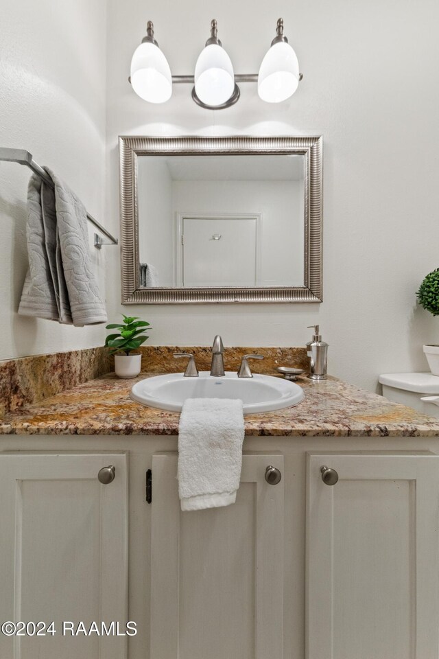 1316 Dulles Dr Apt H, Lafayette, LA 70506 - bathroom featuring vanity and toilet