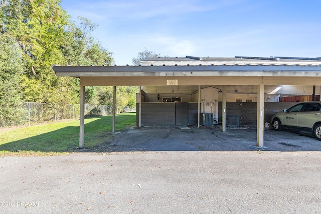 view of parking featuring a carport