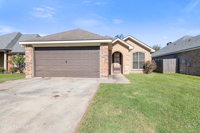 single story home with a garage and a front yard