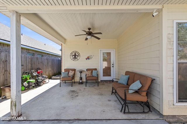 view of patio with ceiling fan and an outdoor hangout area