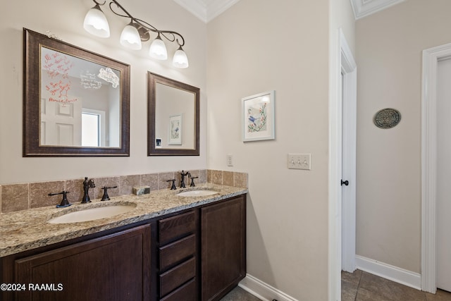 bathroom featuring vanity, tile patterned floors, and ornamental molding