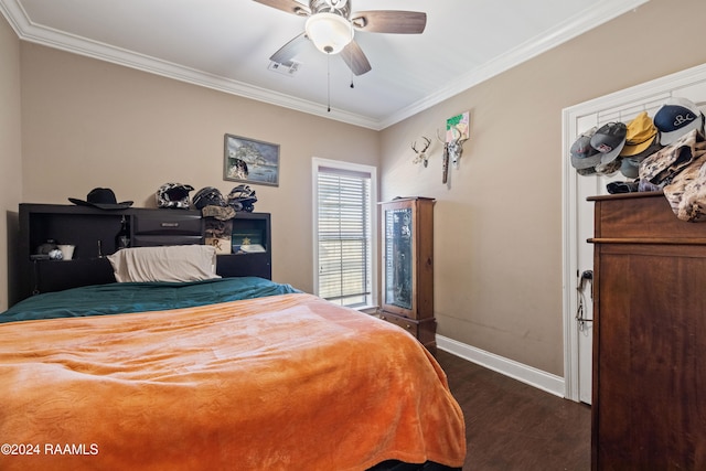 bedroom with crown molding, ceiling fan, and dark hardwood / wood-style flooring