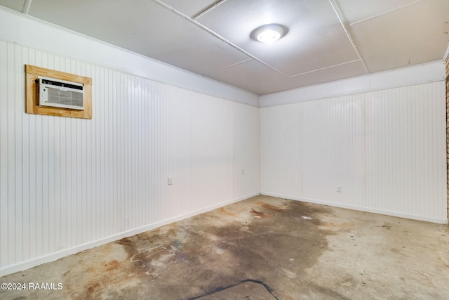 basement featuring a wall unit AC