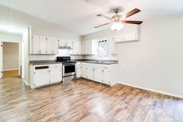 kitchen featuring white cabinetry, electric range, sink, light hardwood / wood-style floors, and ornamental molding