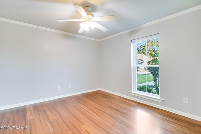 unfurnished room with light hardwood / wood-style flooring, ceiling fan, and crown molding