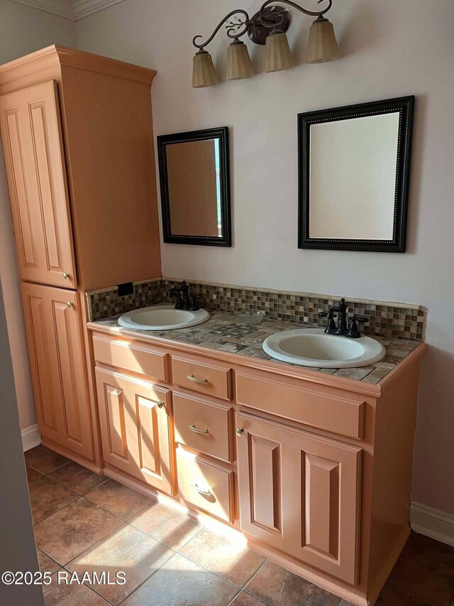 full bathroom featuring double vanity, a sink, and backsplash