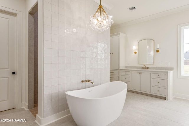 bathroom featuring a bathtub, vanity, an inviting chandelier, tile patterned flooring, and tile walls