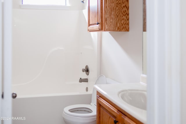 full bathroom featuring vanity, toilet, and tub / shower combination