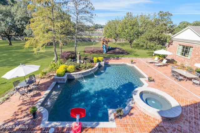 107 Western Ln, Lafayette, LA 70507 - swimming pool with an in-ground hot tub, a patio, and a lawn
