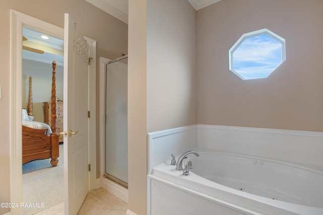 bathroom with tile patterned flooring, independent shower and bath, and ornamental molding