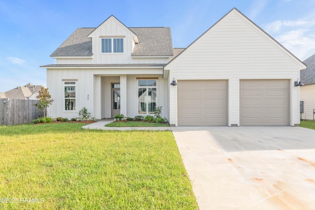 407 Sunshine Rise Dr, Broussard, LA 70518 - view of front of home featuring board and batten siding, driveway, roof with shingles, and a garage