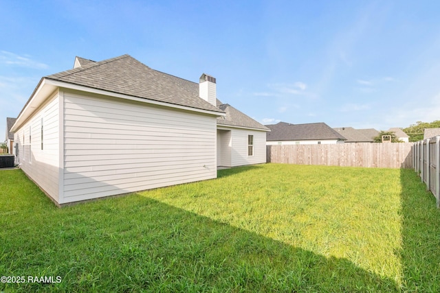 407 Sunshine Rise Dr, Broussard, LA 70518 - back of property featuring a shingled roof and a chimney