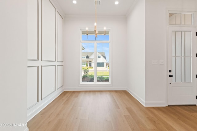 407 Sunshine Rise Dr, Broussard, LA 70518 - unfurnished dining area with light wood finished floors, a chandelier, ornamental molding, and recessed lighting