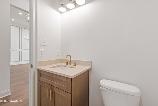 407 Sunshine Rise Dr, Broussard, LA 70518 - half bath with vanity and wood finished floors