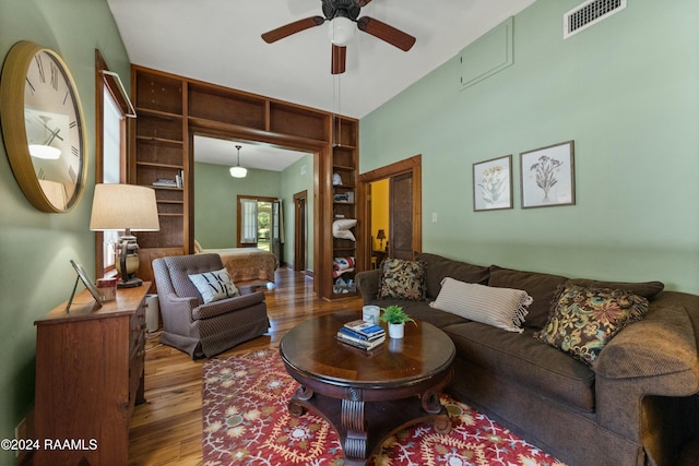 193A Notre Reve Ln, Arnaudville, LA 70512 - living area with ceiling fan, wood finished floors, and built in features
