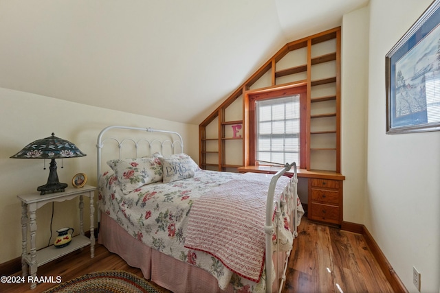 193A Notre Reve Ln, Arnaudville, LA 70512 - bedroom with lofted ceiling and wood finished floors