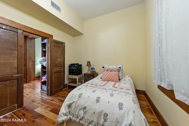 193A Notre Reve Ln, Arnaudville, LA 70512 - bedroom with wood finished floors and baseboards