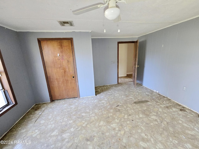 unfurnished bedroom with ceiling fan