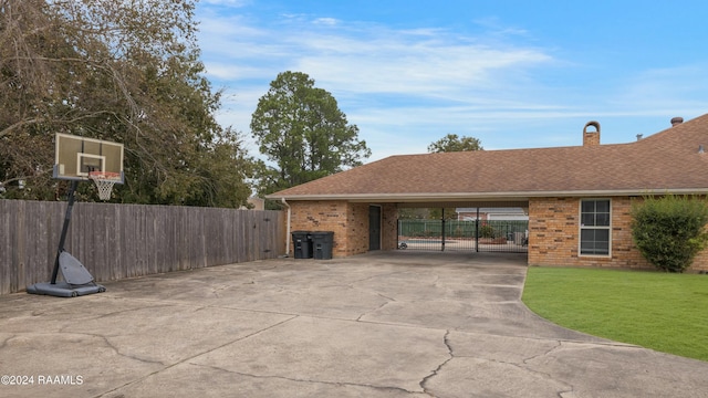 view of patio / terrace with a carport