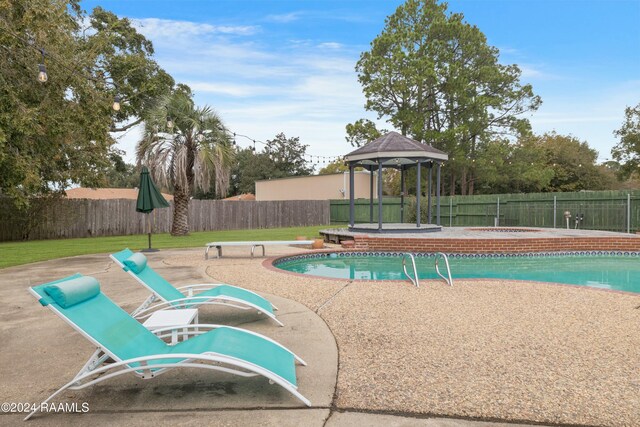 view of pool with a gazebo and a patio area